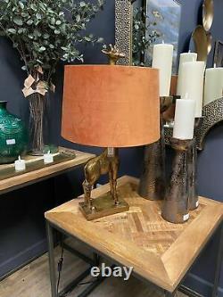 Antique Gold Giraffe Table Lamp With Burnt Orange Velvet Shade