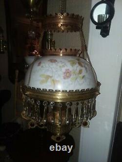 Antique hanging oil/kerosene parlor lamp with three ruby gems