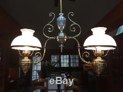 Hanging vintage electrified oil lamp with two glass shades, adjustable length to