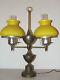 Vintage Brass Victorian Dual Student Piano Table Lamp With Yellow Glass Shades