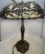 Vintage Decorative Table Lamp With Ornate Metal And Slag Glass Shade